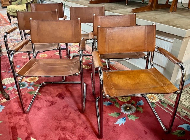 Vintage Italy Cognac Vegetal Leather Dining Chairs: Vintage Italy Cognac Vegetal Leather Dining Chairs. 6 Armchairs Cantilever With Leather Wrapped Arms. Approx. 31"h X 24"w X 22"d. Some Leather Worn Heavier Than Others. Photos Are Considered Part Of T