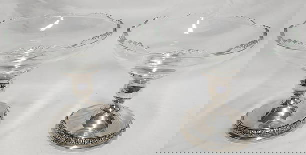 Pair of Sterling Candle Holders w/Glass Compotes: Pair of Prelude international weighted sterling candlestick holders with detachable glass compote bowls. Approx. 5.5"H. Photos are considered part of the description and condition.