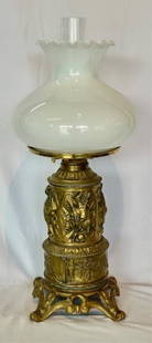 Vintage Metal Oil Lamp w/ Milk Glass Shade: Vintage Metal Oil Lamp with Milk Glass Shade. Possibly Pot Metal. 4 Different Wildlife Scenes with boats around the bottom. No. 2 Queen Anne Burner. Approx. 22.5"H. Photos Are Considered Part Of The