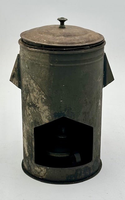 Antique Civil War Tin Camp Stove: Antique Civil War Tin Camp Stove. Includes Cooking Cups and Fire Lamp. Aged Condition. Approx. 8.5"H. Photos Are Considered Part Of The Description and Condition.
