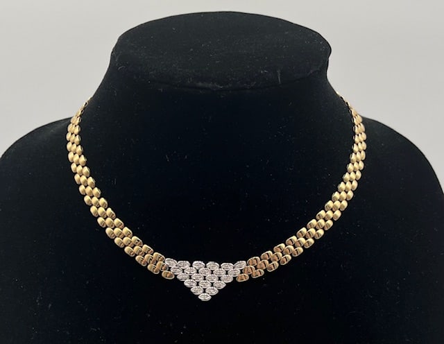 14k Panther Necklace with Diamond Accents 29.5g TW: 14k 2-Tone panther necklace with diamond accents. 29.5g TW. 16.5"L. Photos are considered part of the description and condition.