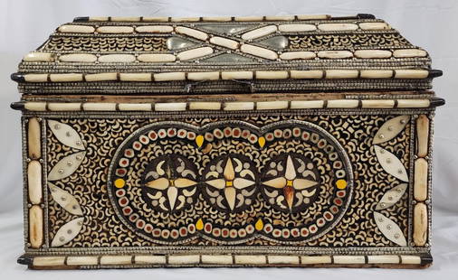 Beautiful Bone Inlaid Moroccan Dowry Box: Beautiful Bone Inlaid Moroccan Dowry Box. Camel Leather Lining. Shows some age - missing some metal trim pieces and one handle. Approx. 13"H x 21"W x 12.5"D. Photos Are Considered Part Of The