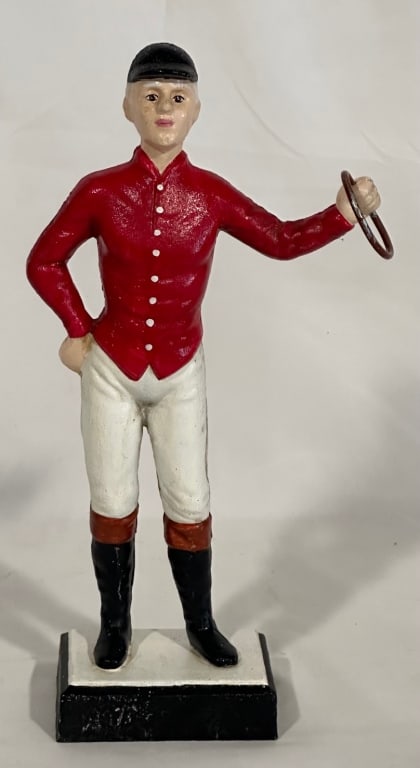 Cast Iron Lawn Jockey: Cast Iron Lawn Jockey. Possible Reproduction? Approx. 13"H. Photos Are Considered Part Of The Description And Condition.