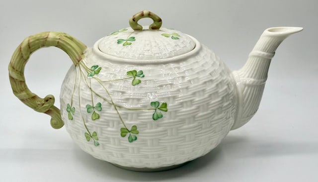 Belleek Ireland Shamrock Basketweave Teapot: Belleek Ireland Shamrock Basketweave Teapot. In great condition - no chips, cracks or knicks. Approx. 5"H. Photos Are Considered Part Of The Description And Condition. 906-87.