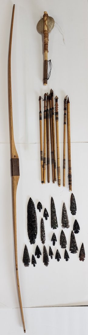 Collection of Native American Tools: Collection of Native American hunting tools. Bow (no string) with 8 arrowhead spears. 19 Arrowheads in asst. sizes. Stone head war hammer. Age unknown on all pieces. Photos are considered part of the