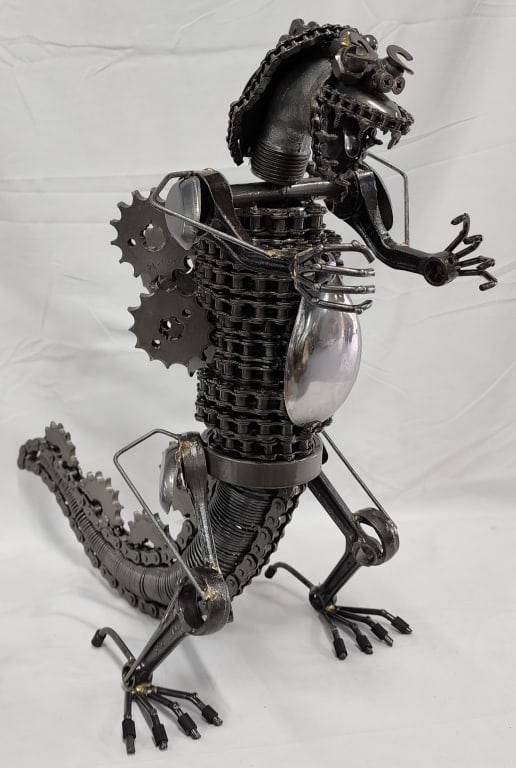 17" Dinosaur Metal Art Sculpture: 17" Metal art dinosaur sculpture. Made from nuts, bolts, chains, gears, etc. Photos are considered part of the description and condition. 220-54A