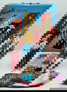 Vintage Barbie Doll Case, (2) Dolls, & Accessories: Vintage Barbie doll case, (2) dolls, & accessories featuring: Barbie doll case with buckle and handle to transport. Cardboard is exposed on bottom right corner. Inside has wear, slight warping,