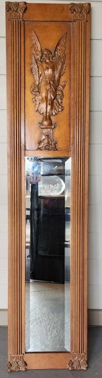 Vintage Style Ornate Wood Pier Mirror: Vintage style ornate wood pier mirror with carved angel. Cracks in wings of figure. Approximately 64"h x 13"w. Photos are considered part of the condition and description.