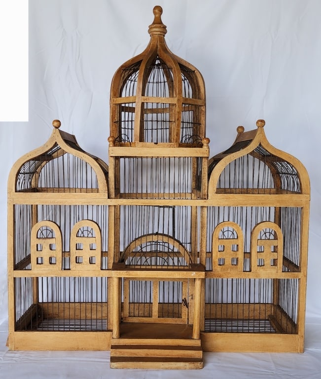 Vintage Taj Mahal Style Wooden Bird Cage: Vintage Taj Mahal style wooden bird cage. Dome top, wood, & wire. One finial missing. Approximately 32"h x 27.5"w x 9"d. Photos are considered part of the condition and description. 820-11