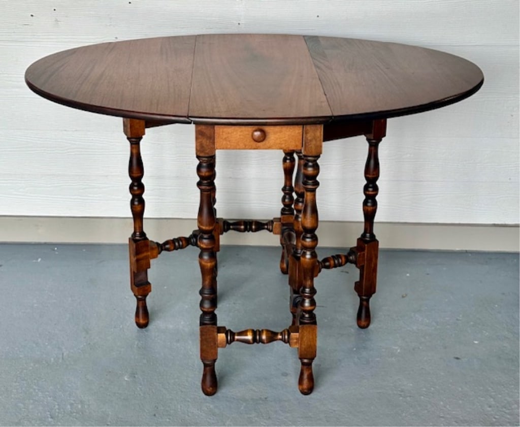 Beautiful Gate Leg Double Drop Leaf Table: Beautiful Rock Hills Furniture Co. gate leg double drop leaf table. Single drawer. Approximately 30"h x 46"w x 33"d. 13.5" wide with both drops down. Photos are considered part of the condition and de