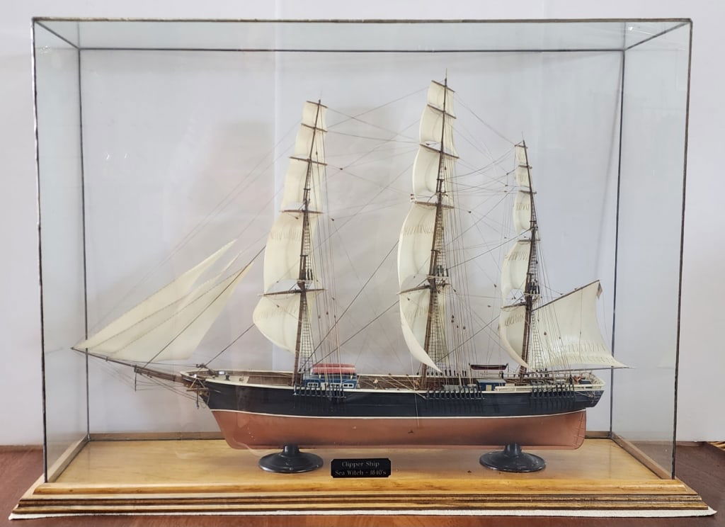 "Sea Witch" 1840's Clipper Ship Model: "Sea Witch" 1840's clipper ship model in glass display glass. Approximately 24"h x 36"w x 12"d. Photos are considered part of the condition and description. 301-3