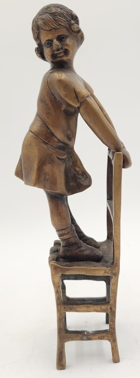 Bronze? Girl on Chair after Juan Clara: Bronze? sculpture of young female standing on chair. Styled after Juan Clara. Approximately 11"h. Photos are considered part of the condition and description. R