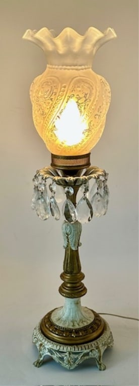 Girandole Lamp by Capital Mould Casting Co.: Beautiful lamp by Capital Mould Casting Co.. Includes hanging prisms, frosted glass shade, and gold accents. In working condition. Approximately 25"h. Photos are considered part of the condition and d