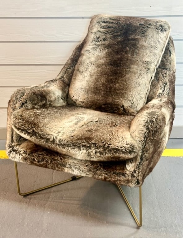 Ashley Furniture Wildau Faux Fur Accent Chair: Ashley Furniture Wildau faux fur accent chair. Faux fur seat in shades of gray. Metal base minimalistic in design. Attached back and loose seat cushion. In excellent condition. Approximately 34.5"h x 