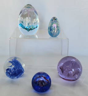 Beautiful Collection of Asst. Glass Paperweights: Beautiful collection of assorted art glass paperweights. Round and egg shaped. Various sizes from 2" to 4". 2 larger ones are signed Caithness Glass Scotland. Photos are considered part of the