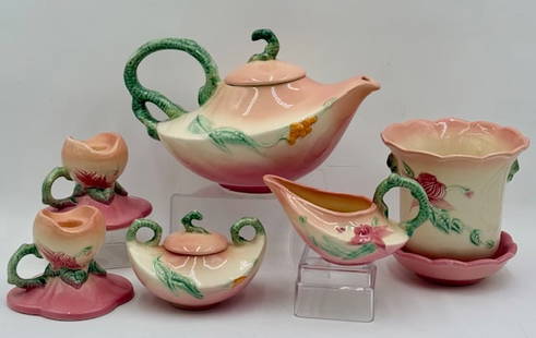 Vintage Hull Pottery Woodland Tea Set & Access.: Vintage Hull Pottery Woodland tea set with lid and accessories. Excellent condition. Includes teapot, 3.5" creamer, 4" sugar dish with lid, 6" planter with attaches saucer, and pair of 4" candle