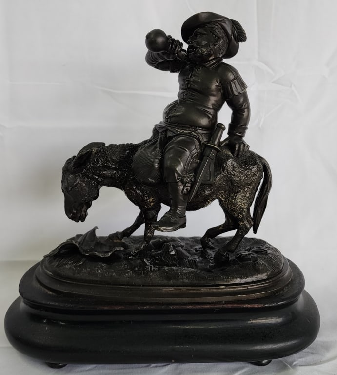 Bronze? Sculpture of Sancho Panza: Bronze? sculpture of Sancho Panza. On wood base. One bolt on wood base missing nut. Approximately 10"h x 10"w x 5.5"d. Photos are considered part of the condition and description. 606-5