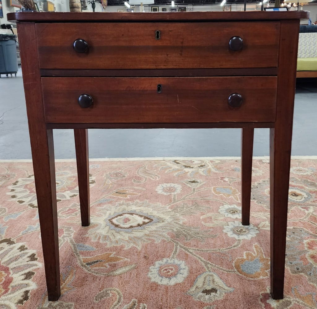 Antique 2 Drawer Wood Side Table: Antique 2 drawer wood side table. No key. Light wear and age spots on top. Approximately 29"h x 28"w x 18"d. Photos are considered part of the condition and description. 606-37