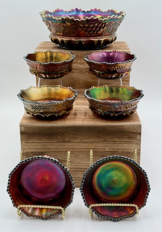 Vintage Northwood Carnival Glass Berry Bowls: Vintage Northwood carnival glass berry bowls. Includes 1 large 3.5"h x 9"w bowl and 6 small 2"h x 5"w bowls. No chips or cracks present. Photos are considered part of the condition and description. 11