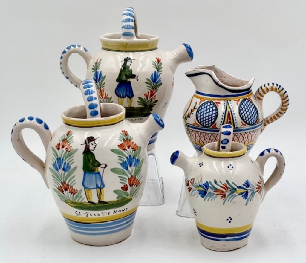 Vintage Quimper French Pottery Pieces: Vintage Quimper French pottery pieces. Includes 4 pieces totals. 2 large jugs, 6.5"h, 1 small jug, 5", and one creamer, 3.75"h. Creamer in aged condition. Photos are considered art of the condition an