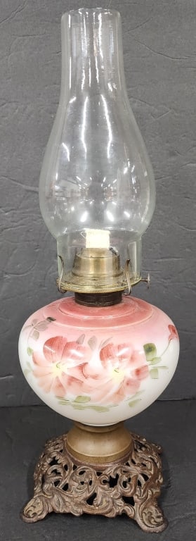 Vintage Hand Painted Porcelain & Iron Oil Lamp: Vintage hand painted porcelain and iron oil lamp. P&A Mfg Co. Floral motif. Approximately 17"h. Photos are considered part of the condition and description. 606-61