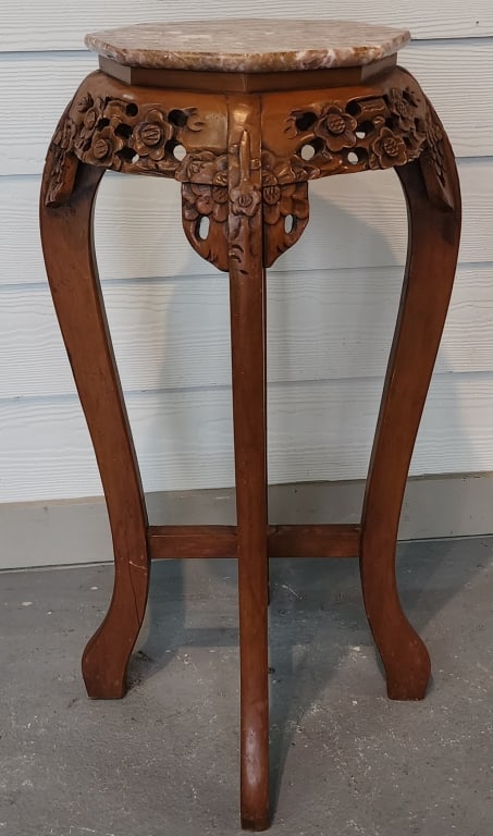 Chinese Carved Wood Marble Top Plant Stand: Chinese carved wood marble top plant stand. Light scratches present on top. Approximately 29.5"h x 12.5"d. Photos are considered part of the condition and description. Y