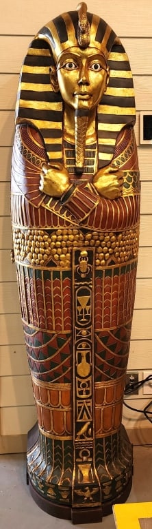 Unique Egyptian Sarcophagus Bookcase: Unique decorator Egyptian sarcophagus bookcase. Painted. 2 sets of internal shelves. Approximately 74"h. Photos are considered part of the condition and description. R