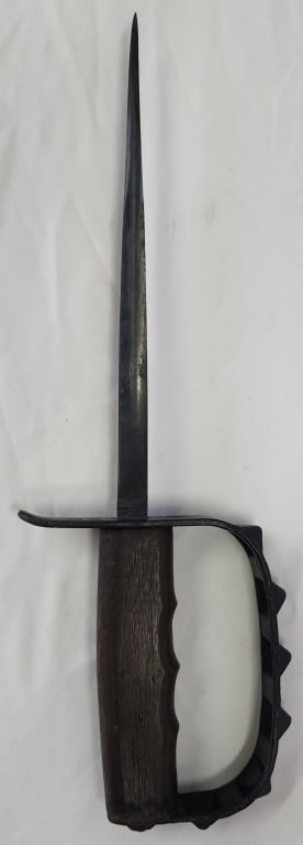 Antique U.S. L.F. & C. 1917 Trench Knife: Antique U.S. L.F. & C. 1917 trench knife. Pyramidal teeth on full knuckle guard. Triangular blade. Approximately 14"l. Photos are considered part of the condition and description. R