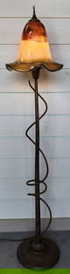 Signed Todd Phillips Quoizel Art Glass Floor Lamp: Quoizel art glass floor lamp. Beautiful iridescent bell form shape shade signed Todd Phillips '06. Featuring ruffled rim and applied threading. Metal base with twist accent. Lamp is in on position and