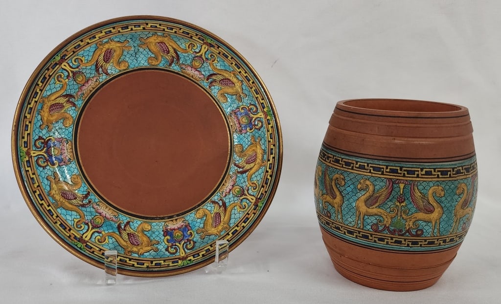 Vintage Christopher Dresser For Prattware Pottery: Vintage Christopher Dresser for Prattware pottery pieces. Includes jar and plate. Both terracotta and enameled. Small chip inside jar. Jar approximately 4.5"h and plate 6.75"w. Photos are considered p