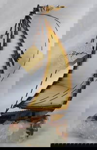 Vintage John Demott Signed Brass Sailboat On Onyx Base: Vintage signed John Demott brass sailboat. On onyx base. Approximately 9.5"h x 7.75"w x 4"d. Photos are considered part of the condition and description. 315-56