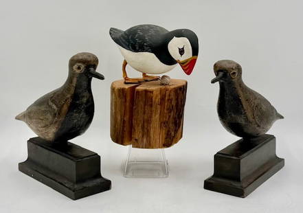 3pc Collection Wooden Shore Bird Sculptures: 3pc Collection of wooden shore bird sculptures. Puffin is artist signed. Puffin approximately 8"h x 4.5"w x 9.5"l. Pair of birds approximately 8.5"-9"h x 7"l x 2.75"w. Photos are considered part