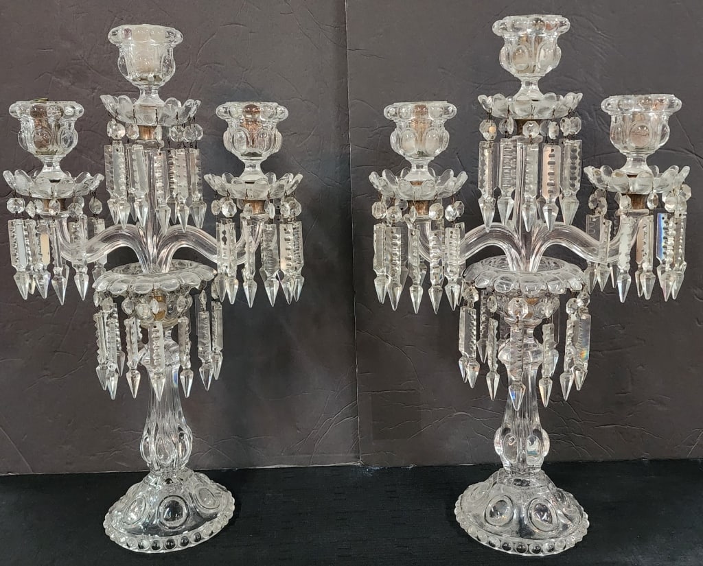 Pair of Beautiful 3 Arm Candelabras: Pair of beautiful 3 arm candelabras. Arms adorned with prisms. Approximately 21"h x 13"w. Photos are considered part of the condition and description. 603-117
