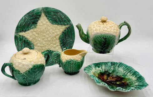 5pc Majolica Pottery Cauliflower Pottery: 5pc Majolica Pottery cauliflower pottery pieces. Includes covered teapot, covered sugar dish, Wedgwood creamer, plate, and dish. Some chips and cracks present. Photos are considered part of the