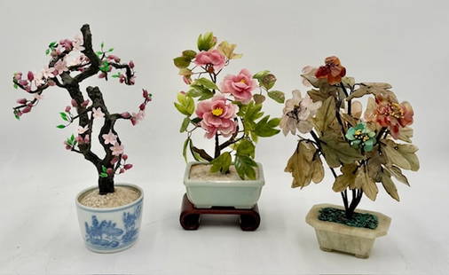 3 Beautiful Jade Trees: 3 Beautiful jade trees. Includes 10.5"h x 7"w cherry blossom tree in blue and white pot, 9"h x 6"w pink flowers with removable wood base, and 9"h x 6.5"w multi color flower tree. Photos are