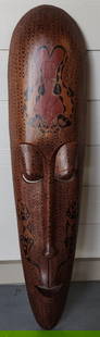 Vintage Hand Carved African Tribal Mask: Vintage hand carved African tribal mask. Hand painted details. Some paint wear and scratches. Approximately 39.5"h x 9.5"w. Photos are considered part of the condition and description. 205-11