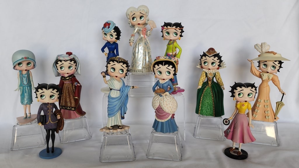 11pc Vintage Danbury Mint Betty Boop Figurines: 11pc Vintage Danbury Mint Betty Boop figurines. Includes Flower Power Betty, Sock Hop Betty, Thoroughly Modern Betty, Elizabethan Betty, Masquerade Betty, Camelot Betty, Grecian Betty, Flapper Betty,