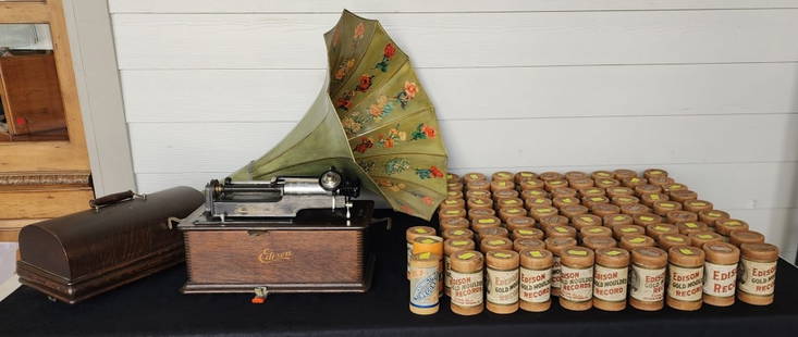 Vintage Edison Home Phonograph: Vintage Edison home phonograph. Includes horn and over 80 assorted cylinders. Horn does not attach properly. Serial # 326446. Working condition unknown. Horn approximately 31". Phonograph approximatel