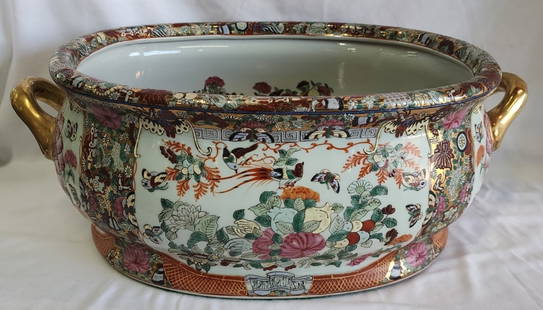 Vintage Chinese Famille Rose Porcelain Jardiniere: Vintage Chinese Famille Rose porcelain jardiniere planter. Excellent condition. Stamped on bottom. Approximately 8.5"h x 22"w x 14.5"d. Photos are considered part of the condition and description. 115