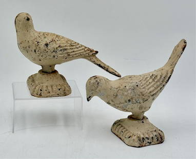 Pr. Vintage Cast Iron Garden Birds: Pair of small vintage cast iron garden birds. Both have been painted. Paint loss and rust present. Approximately 5.5"h x 6.75"l x 3"w and 5"h x 7"l x 3"w. Photos are considered part of the condition a