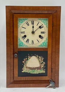 Antique Seth Thomas Reverse Painted Wall Clock: Antique Seth Thomas wall spring clock. Featuring a mahogany case with hand painted bee hive reverse painted panel. Includes key. Does wind but does not chime. Back carved RMT 1926?. Approximately 15.7
