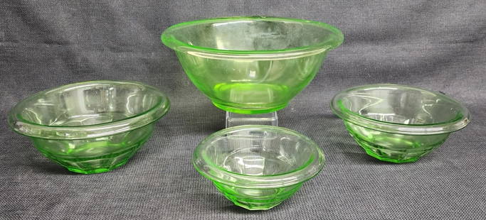 Vintage Hazel Atlas Uranium Glass Nesting Bowls: Vintage Hazel Atlas green uranium glass nesting bowls. Includes small 2.5"h x 5.5"w, medium 3"h x 6.5"w, large 3.5"h x 7.5"w, and bonus bowl 4.5"h x 10"w. 4 Total bowls. Photos are considered part of