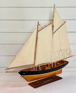 1851 'America' U.S. Schooner Model Yacht: 'America' U.S. Schooner model yacht depicting the winning yacht from the 1851 America's Cup. Wood and cloth model. Approximately 32"h x 36"l x 6.25"w. Photos are considered part of the condition and d