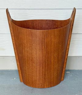 Norwood Ltd. Teak Bentwood Waste Basket: Mid century teak bentwood waste basket. Manufactured by Norwood Ltd. Some minor scuffs and scratches present. Approximately 17.25"h x 15"w x 9.25"d. Photos are considered part of the condition and des