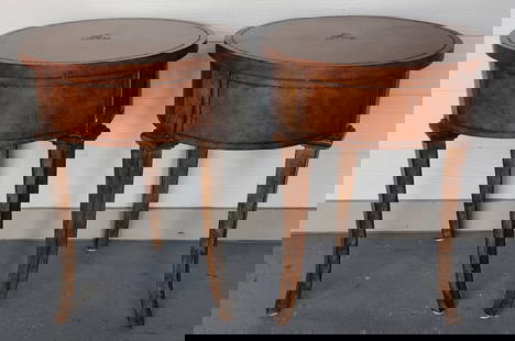 Pr. Round M.P. Leather Wrapped Occasional Tables: Pair of round M.P. leather wrapped occasional tables. 3 Leg style. Some scratches present on leather. Approximately 24"h x 18"w. Photos are considered part of the condition and description. 603-70