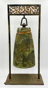 Tony Evans Raku Pottery Bell w/ Stand: Tony Evans Raku pottery bell with stand. Bell is just over 12" tall and constructed with a copper banded accent near the top. Signed on inside of bell. Metal stand. Approximately 24.25"h x 12"w x 6"d.