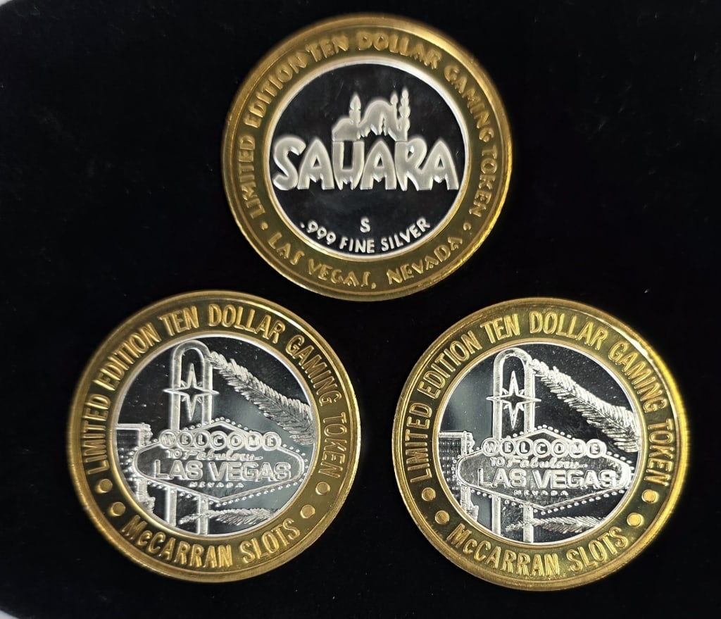 L.E. .999 Fine Silver $10 Vegas Casino Tokens: 3 Limited edition .999 fine silver $10.00 Las Vegas casino gaming tokens. All in hard plastic protective cases. Includes Sahara token and pair of Las Vegas McCarran Slots tokens. All approximately 2"