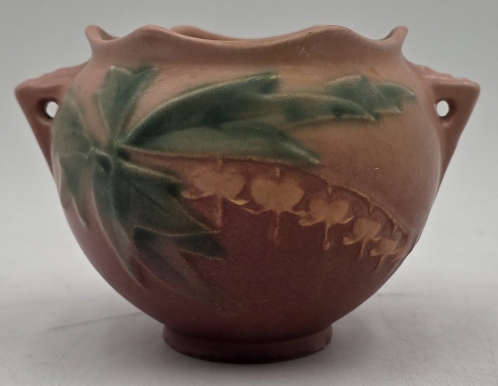 3.5" Roseville 'Bleeding Heart' Pink Jardiniere: Vintage Roseville Pottery 'Bleeding Heart' small jardiniere. #615-3. Pink finish. Approximately 3.75"h x 3.5"w. Photos are considered part of the condition and description. 405-20C