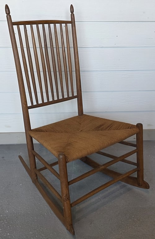 Vintage Oak Shaker Style Rocking Chair: Vintage oak shaker style rocking chair. Rush seat. In good condition for age. Approximately 37"h x 21"w x 28"d. Photos are considered part of the condition and description. 817-3