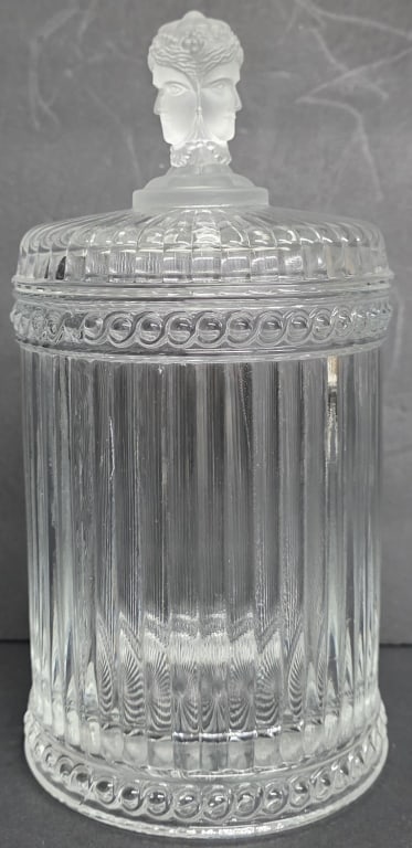 Vintage MMA Imperial Glass Biscuit Jar: Vintage MMA Imperial columnar glass biscuit jar. Features 3 frosted face finial lid. In excellent condition with no chips or cracks. Approximately 10"h. Photos are considered part of the condition and